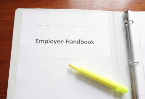 employee handbook leads to dismissal of fmla claims against